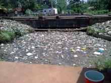 Solid waste accumulated n Mullissery Canal. Source: I. Raj (2011), sswm.info. Creative Commons Licence