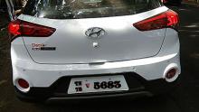 Car with number plate displayed not to specifications