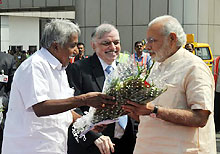 Prime Minister Narendra Modi being received at Karippur airport on Tuesday