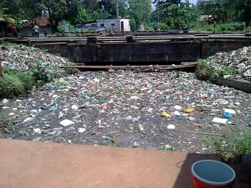 Solid waste accumulated n Mullissery Canal. Source: I. Raj (2011), sswm.info. Creative Commons Licence