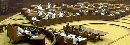 Opposition protesting in Kerala Asssembly on Thursday